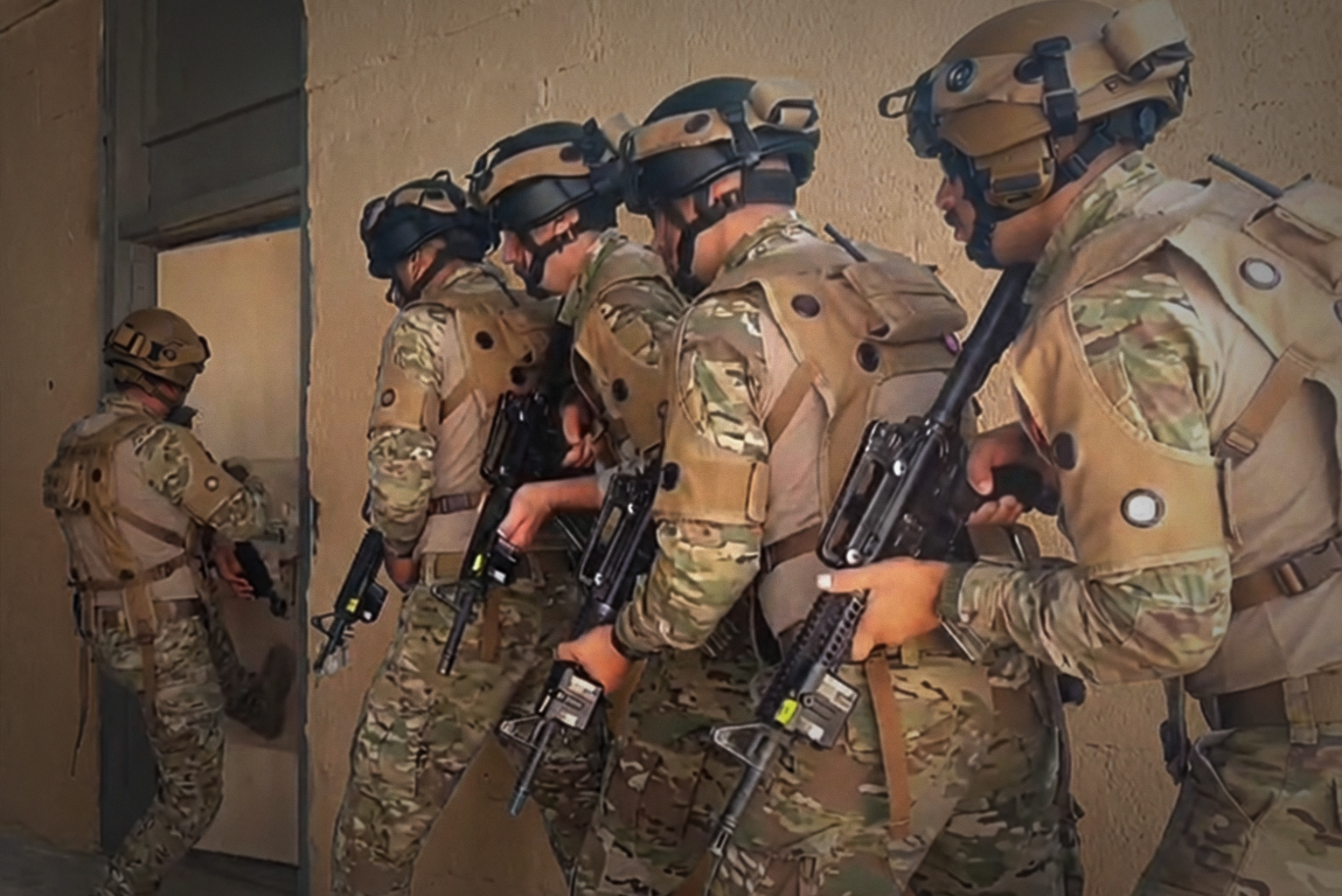 Soldiers wearing LETS sensor vests and helmet sensors during training